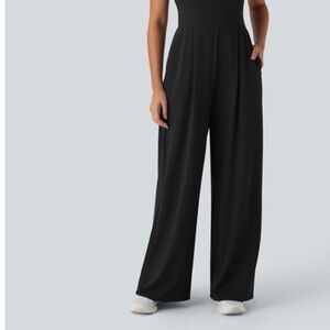 NWT Halara Elegant Black Jumpsuit Twist Back Flare Leg Med